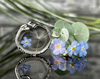 Dandelions and forget-me-nots, fine silver-colored pendant with real dandelion seeds and flowers, resin, floral jewelry, bezel