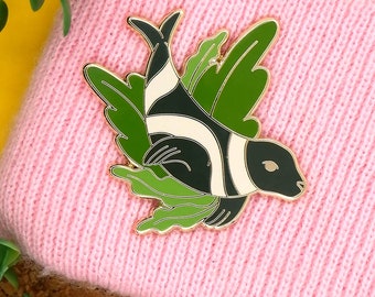 Ribbon seal enamel pin. Endangered animal jacket lapel pin.