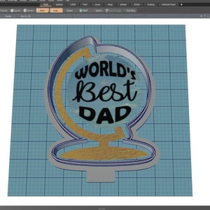 May include: A blue and gold globe cookie cutter with the text "WORLD'S BEST DAD" in black lettering.