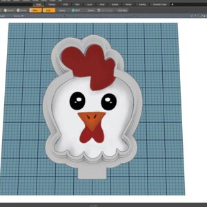 May include: A white and red plastic cookie cutter shaped like a chicken head. The chicken has large black eyes and a red beak and comb.