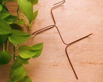 Abstract indoor plant support, upcycled copper plant stake
