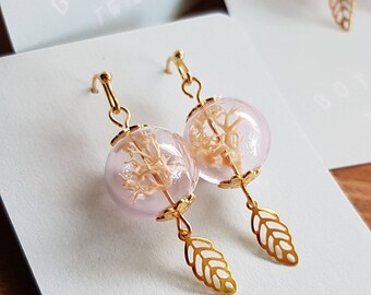 Pink Glass Terrarium Bead Earrings with plated gold tone hooks and leaf charm dangles