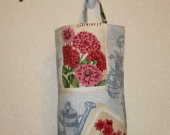 Plastic bag holder, grocery bag holder, bag holder/storage, bag dispenser.
