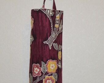 Plastic bag holder, grocery bag holder, bag holder/storage, bag dispenser.