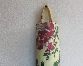 Plastic bag holders, grocery bag holders, bag storage, plastic bag dispensers.