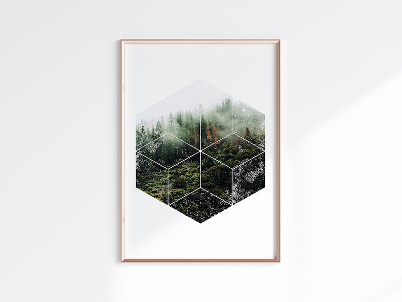 May include: A framed art print depicting a forest landscape within a geometric cube. The image shows a dense green forest with a misty atmosphere, set within a gold-coloured frame. The artwork has a modern, nature-inspired aesthetic.