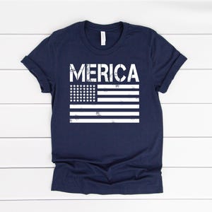 a t - shirt with the word merica printed on it