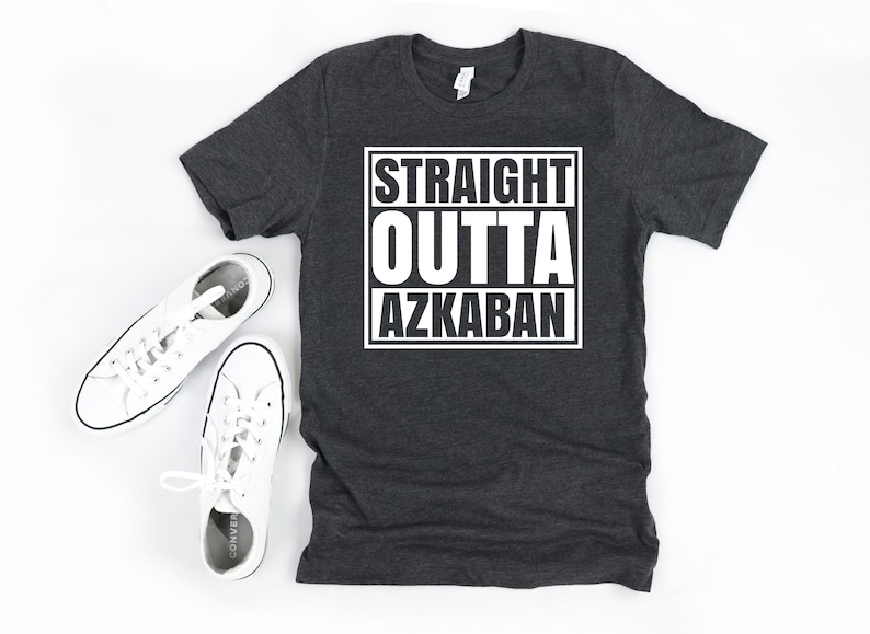 a t - shirt with the words straight, outta, and a pair of