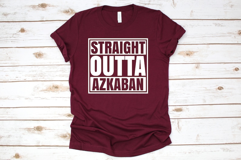 a maroon tshirt with the words straight, outta, azzaba