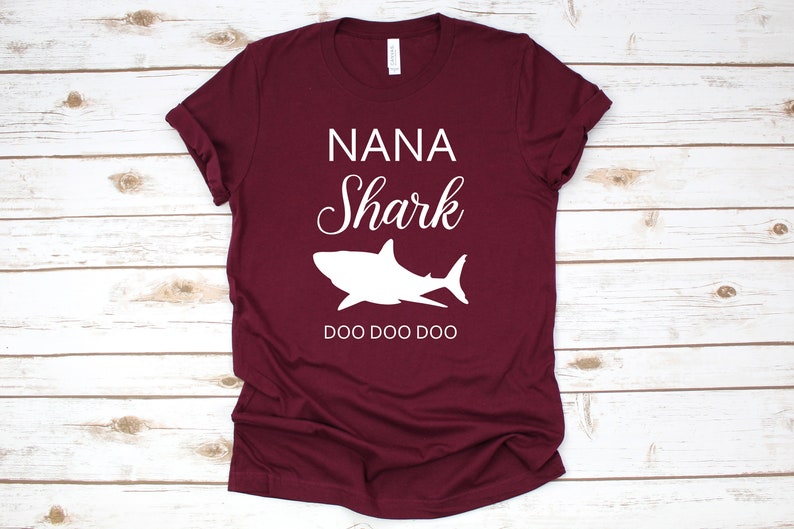 a maroon shirt that says nanna shark doo doo doo doo doo doo doo doo