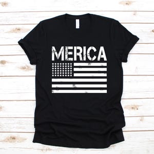 a black shirt with the american flag on it
