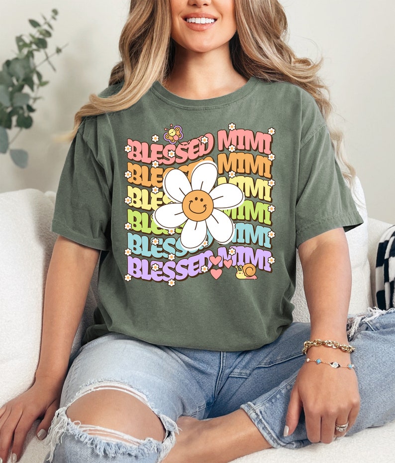 a woman sitting on a couch wearing a green shirt