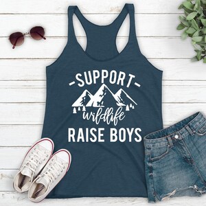 a tank top that says support while raise boys