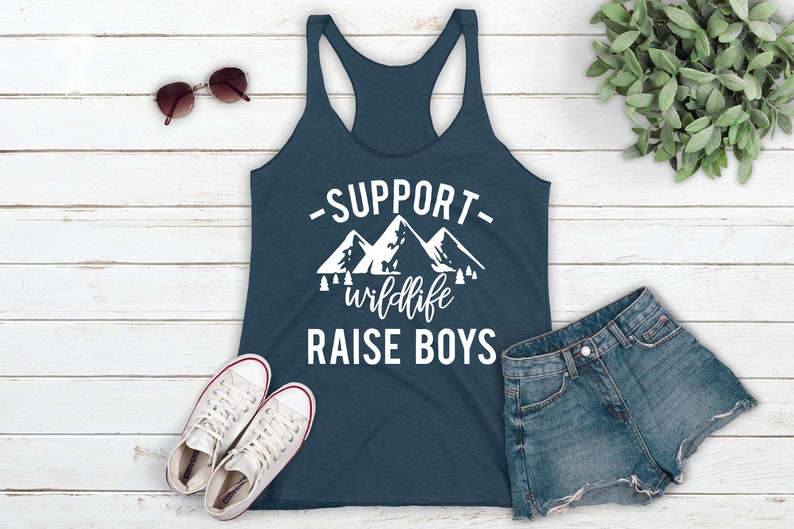 a tank top that says support while raise boys