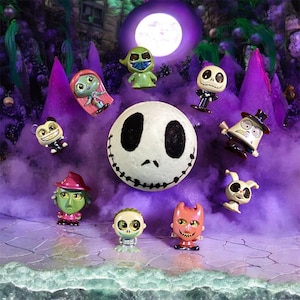 May include: A collection of miniature figurines inspired by "The Nightmare Before Christmas." The figures include Jack Skellington, Sally, Oogie Boogie, and other characters. The background features a purple, spooky scene with a full moon.