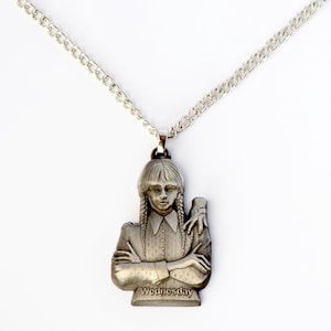 Wednesday Addams & Thing Pendant Necklace: Gothic Horror Jewelry