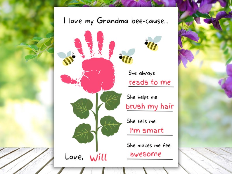 May include: A white card with the text "I love my Grandma bee-cause..." features a pink handprint flower with green leaves and three cartoon bees. The text includes "reads to me", "brush my hair", "I'm smart", and "awesome". Signed "Love, Will".