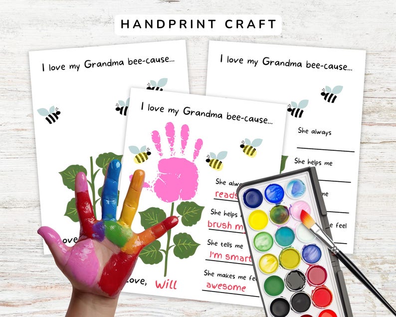May include: A handprint craft kit with the text "I love my Grandma bee-cause..." and a hand painted in rainbow colors. The kit includes a watercolor palette, a paintbrush, and printed sheets with bee illustrations.