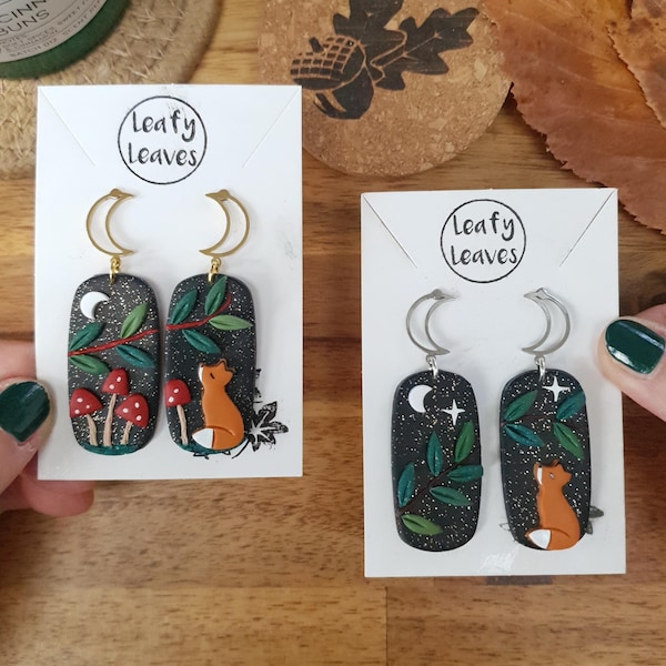 Midnight sky asymmetrical earrings with foxes and leaves or mushrooms