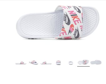 sale on nike slides
