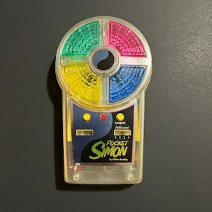 Pocket Simon 1995 Milton Bradley MB Handheld Electronic Game Clear 1990s Vintage Handheld