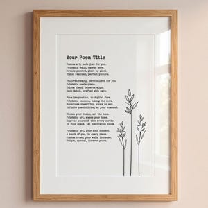 May include: A framed wall art print featuring a poem titled Your Poem Title in a typewriter-style font on a white background. To the right of the text are three simple black line drawings of tall, slender grass stalks with thin leaves.