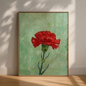 May include: A framed oil painting featuring a single vibrant red carnation flower centered against a textured light green background. The artwork displays visible brushstrokes and thick paint application, enclosed in a thin gold-colored frame.