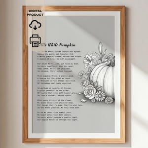 May include: A framed digital print featuring a black and white illustration of a pumpkin surrounded by flowers. The print includes the poem "Little White Pumpkin" in a serif font. The frame is a light brown color.