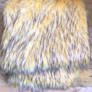 Faux yellow with black arctic fox fur Artificial yellow with black fur Imitation fox fur Fur fabric for needlework toys clothes