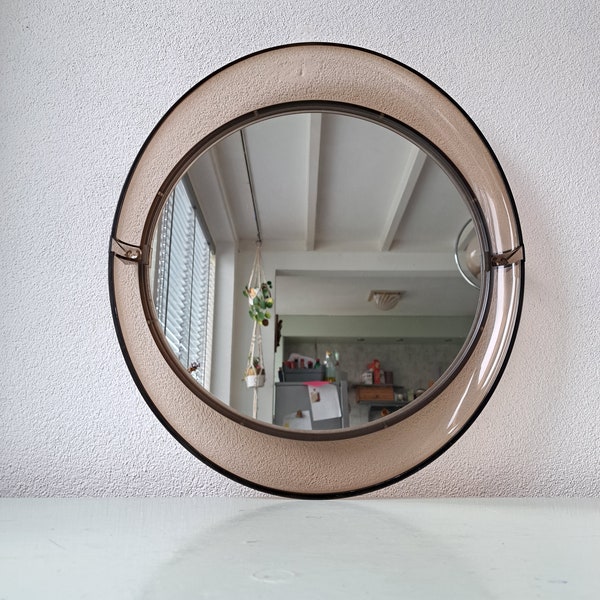 Very beautiful oval brown plexiglass mirror from the 1970s