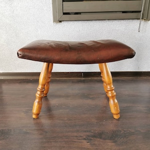 Beautiful wooden footstool with leather upholstery, 70s