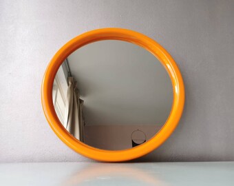 Vintage plastic orange round mirror, 70s