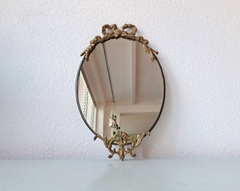 Small Art Deco style cast iron oval mirror, 1960s