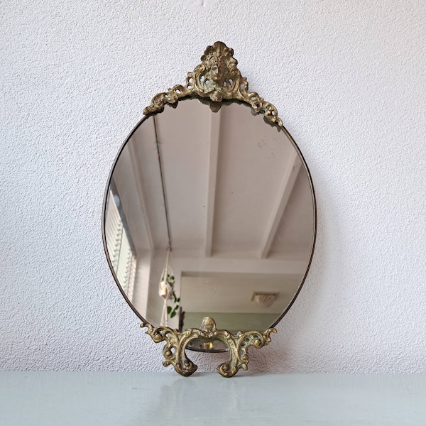 Art Deco style cast iron mirror oval, 60s