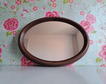 Vintage oval mirror from the 80s