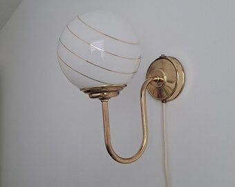 Vintage metal wall lamp with a white glass ball with gold stripes, 80s