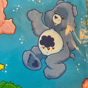Carta da regalo Care Bear e fiocco abbinato