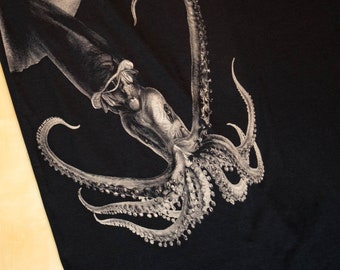 May include: Black t-shirt with a graphic print of a squid or octopus with tentacles.