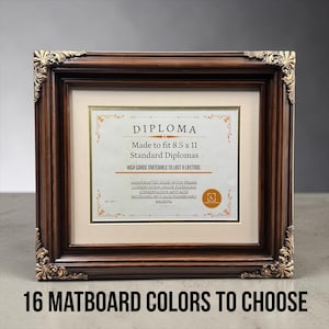 May include: A diploma frame with a dark brown wood finish and ornate gold corner accents. The frame holds a diploma that fits 8.5 x 11 inch documents. Text at the bottom reads "16 Matboard Colors to Choose".