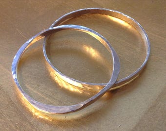Hand made, hammered sterling silver bracelet and ring.