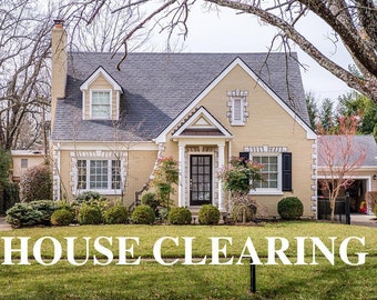May include: A yellow brick house with a gray roof and a black front door. The house has a sign in the front yard that says "HOUSE CLEARING".