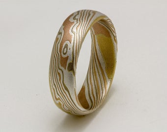 Mokume Gane Ring in 18k yellow gold,14k white palladium gold, 14k rose gold, and sterling  silver