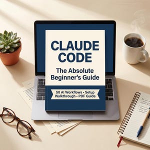 May include: A laptop displays a book titled "CLAUDE CODE: The Absolute Beginner's Guide." The book cover is white with navy blue text. Beside the laptop are a cup of coffee, a succulent plant, eyeglasses, and a notepad with a pen.