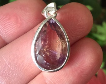 Ametrine pendant. Hand cut, faceted and set in the finest silver
