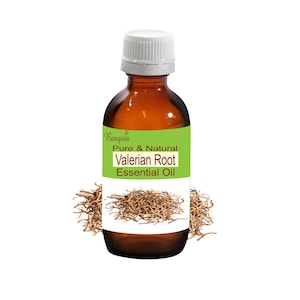 May include: A brown glass bottle with a white cap, labeled "Bangoia Pure & Natural Valerian Root Essential Oil". The bottle is surrounded by dried brown valerian root.