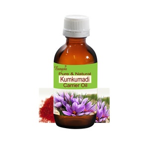 May include: A brown glass bottle with a white cap, labeled "Bangoia Pure & Natural Kumkumadi Carrier Oil". The bottle is sitting on a green background with a close-up of purple saffron flowers.