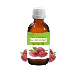 May include: A brown glass bottle with a white cap, labeled "Bangoia Pure & Natural Red Raspberry Seed Carrier Oil". The bottle is surrounded by red raspberries.