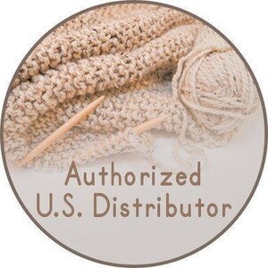 May include: A close-up of a beige knitted fabric with a ball of yarn and knitting needles. The text "Authorized U.S. Distributor" is printed on the fabric.