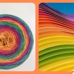 May include: A skein of rainbow colored yarn with a multi-colored center. The yarn is wound into a circle and has a variety of colors, including red, orange, yellow, green, blue, and purple.