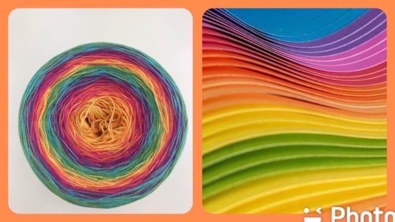 May include: A skein of rainbow colored yarn with a multi-colored center. The yarn is wound into a circle and has a variety of colors, including red, orange, yellow, green, blue, and purple.
